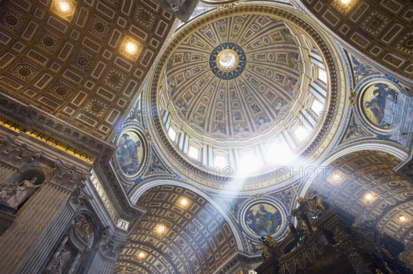 The interior of the Dome of St Peter's Basilica. It is an Italian Renaissance church in Vatican City, the papal enclave within the city of Rome. Vatican, Rome, Italy