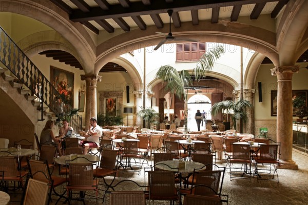 Grand Cafe Cappuccino in a former city palace with inner courtyard, inner courtyard in the Sant Miquel neighbourhood, Old Town, Ciutat Antiga, Palma de Majorca, Majorca, Balearic Islands, Balearic Islands, Spain