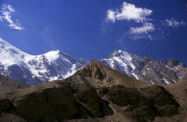 The Pamir Mountains are a mountain range in Central Asia formed by the junction of the Himalayas, Tian Shan, Karakoram, Kunlun and Hindu Kush mountain ranges. They are among the world's highest mountains and since Victorian times they have been known as the 'Roof of the World', a probable translation from the Persian.<br/><br/> The Zhongba Gonglu or Karakoram Highway is an engineering marvel that was opened in 1986 and remains the highest paved road in the world. It connects China and Pakistan across the Karakoram mountain range, through the Kunjerab Pass, at an altitude of 4, 693 metres (15, 397 ft)