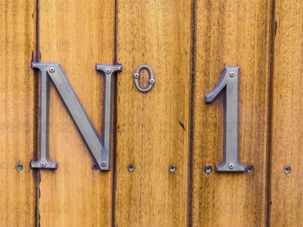 The designation number one on a wagon of a train. Symbolic photo for First and Best. Austria