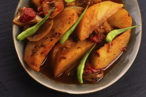 Fried potatoes with paprika sauce. crispy fried patata bravas, fried potatoes with smoked paprika sauce