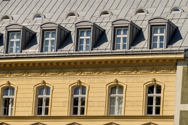 Old building with converted attic, symbol for living space, conversion, capital investment Austria