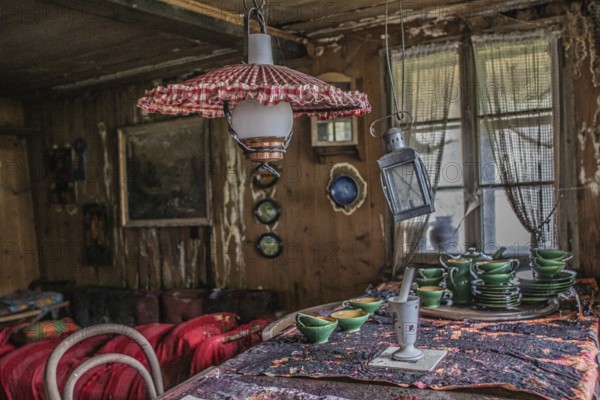 Impressions from the parlour, living room in a lost place, approx. 300 year old farmhouse that has been uninhabited for decades and has since been demolished, Kriens, Lucerne, Switzerland