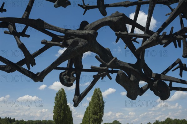 03.06.2017, Dachau, Bavaria, Germany, Europe, A sculpture by Nandor Glid at the Dachau Concentration Camp Memorial. Dachau was the first concentration camp in Germany during the National Socialist era and around 32, 000 people died in Dachau concentration camp during this period