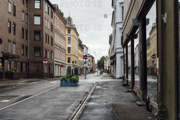 Oslo, Norway, August 11, 2019: Street in Grunerlokka, a trendy hipster neighborhood in central Oslo. Summer rain