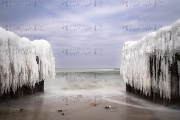 Groyne in winter on the coast of the Baltic Sea near Kühlungsborn