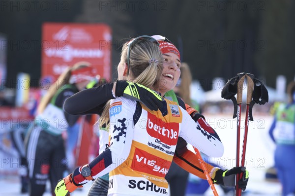 At the finish Nathalie Armbruster (SZ Kniebis) fairly congratulates the day's winner and World Cup leader Ida Marie Hagen Norway after the FIS Nordic Combined World Cup Schonach 2025, Schonach, Germany / Germany