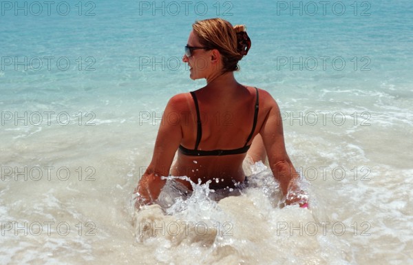 Woman on a sandy beach, Punta Cana, Caribbean, Dominican Republic