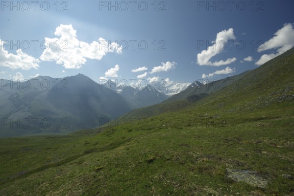 Mountain landscape. Highlands, the mountain peaks, gorges and valleys. The stones on the slopes