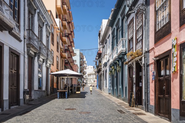 Santa Cruz de La Palma, Spain, August 13, 2021: Shopping street with stores and restaurants in the old town