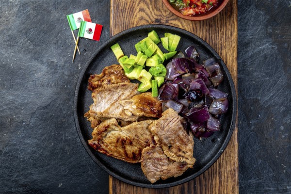 Food, Yucatan Mexican Food Pork POC CHUC poc chuck. Pork marinaded in orange juice served with avocado, purple onion and rustic tomato sauce