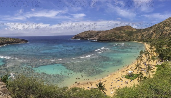 Hanauma Bay a marine embayment formed within a tuff ring and located along the southeast coast of the Island of O?ahu in the Hawaii Kai neighborhood of East Honolulu, in the Hawaiian Islands