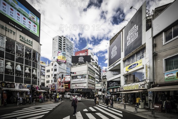 OSAKA, JAPAN - SEPTEMBER 26 2024: The trendy and fashionable Amerikamura district on a clear autumn day in Osaka, Japan