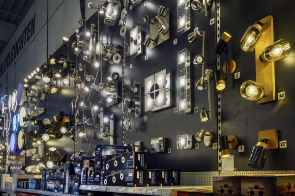 Wall in DIY store with various lights and spotlights, Bavaria, Germany