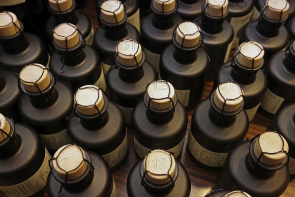 Small bottles, sealed with corks and wire