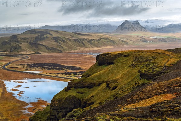 Mountain view on the other side of Dyrholaey lighthouse seen from the top of the mountain, Iceland