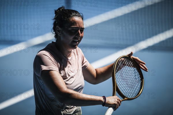 MELBOURNE, AUSTRALIA, JANUARY 12: Ons Jabeur of Tunisia practices with Naomi Osaka of Japan ahead of the 2024 Australian Open at Melbourne Park on January 12, 2024 in Melbourne, Australia