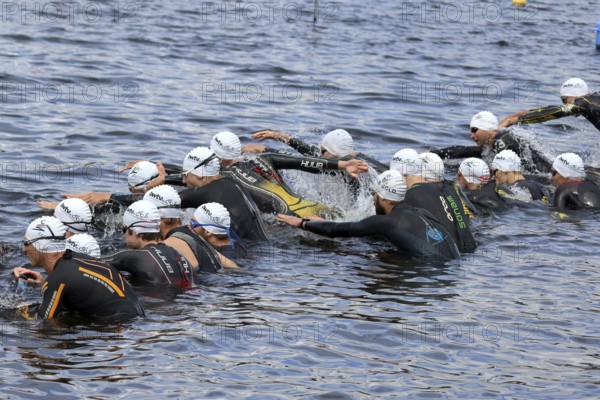 The pack has started: The men of the BaWü League complete the first discipline of the 26th Schluchsee Triathlon, Black Forest Cup 2024 with the swim