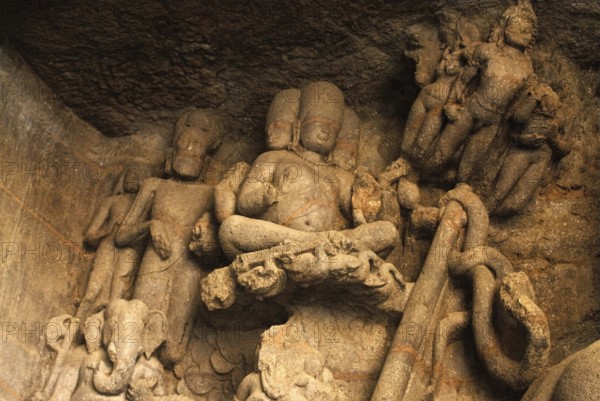 UNESCO-World Heritage Site, Richly stone carved panel, Bramha riding on swans, Lord Ganesh and cupids at Elephanta Caves, Gharapuri now known as elephanta Island, District Raigad, Maharashtra, India