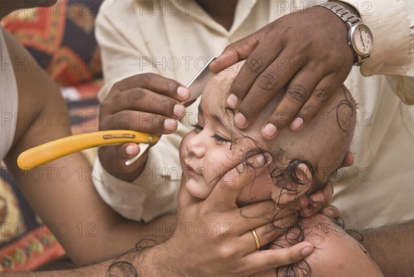 Tonsure baby boy receives hindu rite MR#714H