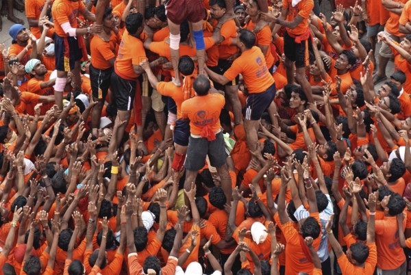 Boys arranging human pyramid on gokulashtami, janmashtami, Bombay Mumbai, Maharashtra, India NO MR 14-August-2009