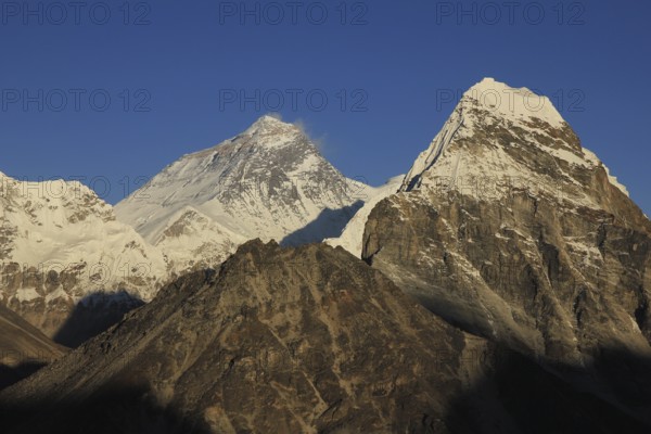 Mt Everest lit by golden evening light, Nepal