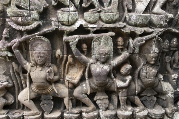 Relief on a wall of the Bayon Temple in Angkor Thom in Cambodia