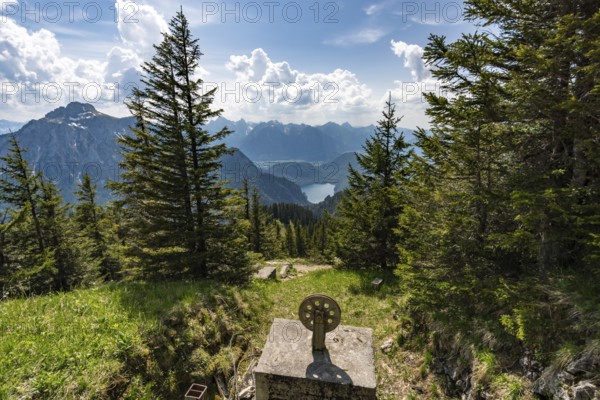 Hiking and climbing on the Tegelberg via the via ferrata at Neuschwanstein Castle in the Ammergau Alps near Schwangau