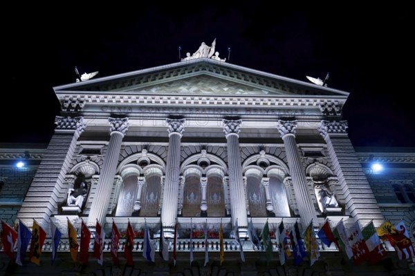 Beautiful Bundeshaus Illuminated Parliament Building or Federal Palace with Canton Flags at Night in City of Bern, Bern Canton, Switzerland