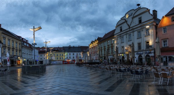Evening mood, rain clouds over the main square, panoramic shot, Leoben, Styria, Austria