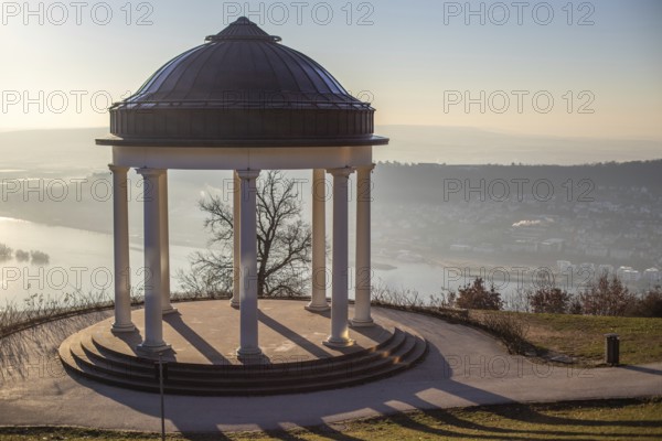 Beautiful temple in a landscape shot. Sunrise on a winter morning. Beautiful view along the Rhine at the Niederwaldtempel, Niederwalddenkmal, Hesse, Germany