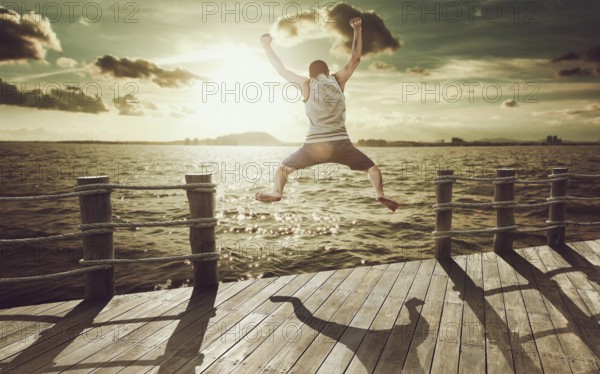 Cliff Jumping into the Ocean at Sunset, Summer Fun Lifestyle