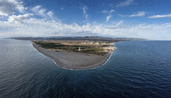 A panorama drone landscape view of Punta Alice beach and lighthouse in Calabria