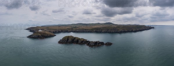 Aerial panorama landscape of the Pembrokeshire coast with the historic Strumble Head Lighthouse