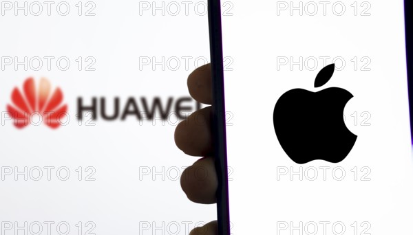 Apple Vs Huawei logo on a smartphone