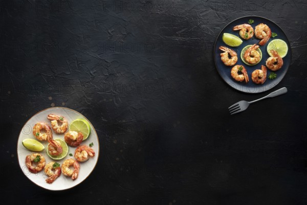 Shrimps, overhead flat lay banner with copy space. Cooked shrimp with lime, shot from the top on a black slate background with a place for text, Food photography, Food photography
