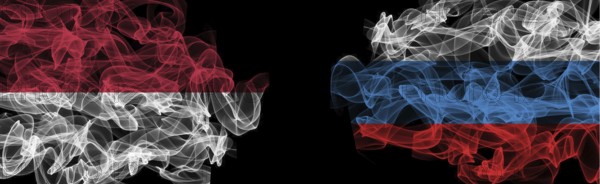 Flags of Indonesia and Russia on black background, Indonesia vs Russia smoke flags