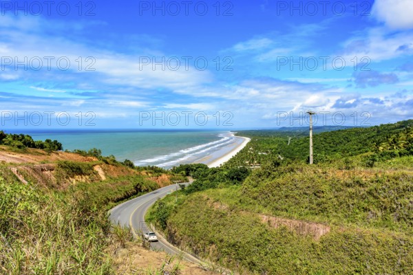 Road along the coast of the state of Bahia next to the beaches of Pe de Serra and Sargi in Serra Grande