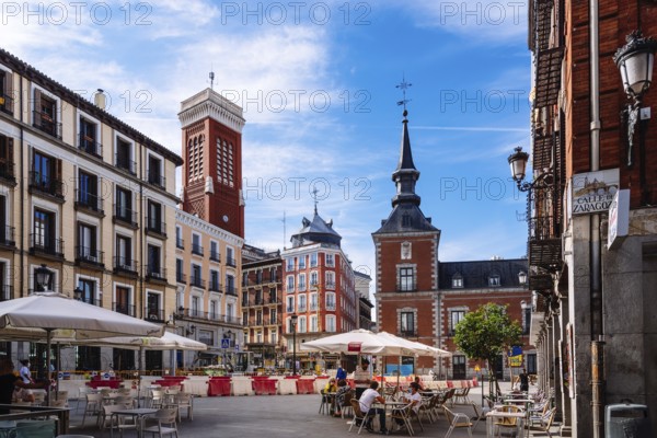 Madrid, Spain, May 8, 2021: Cafe in the Square of Santa Cruz in historical centre of Madrid. Foreign Ministry