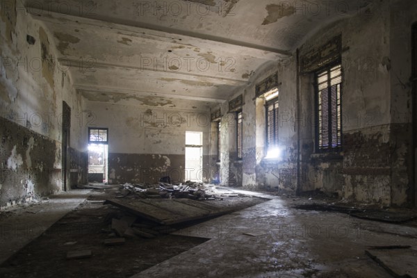 A picture of a scary place in an abandoned asylum