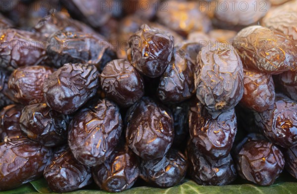 Delicious and sweet dried dates fruit background