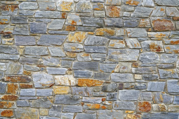 Slate stone masonry stone wall in Andorra Pyrenees