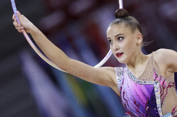 Sofia, Bulgaria - 27 March, 2021: Sabina Tashkenbaeva of Uzbekistan performs during the individual Hoop final at the 2021 Rhythmic Gymnastics Sofia World Cup, Sofia, Bulgaria