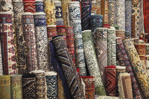 Many colorful carpets in the store. Background
