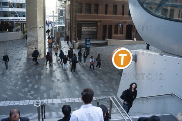 11.05.2018, Sydney, New South Wales, Australia, People walk along a pedestrian walkway in the business district of Barangaroo South. This is part of the 180 metre long pedestrian link called Wynyard Walk
