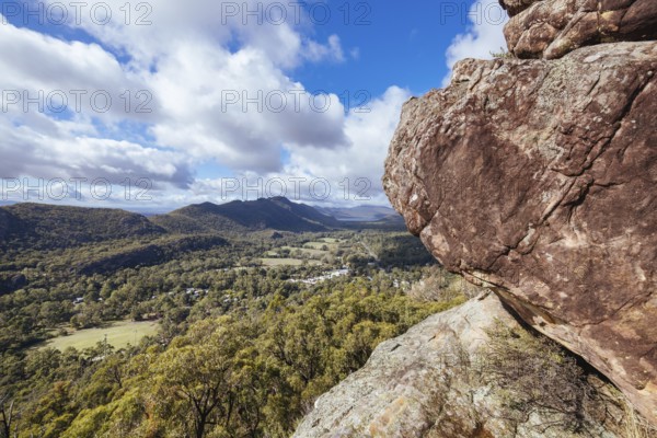 Iconic views from Chatauqua Peak over Halls Gap and surrounds on a warm autumn sunny day in Victoria, Australia