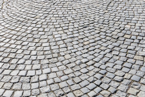Paving stones in pedestrian zone, symbol for path construction, structure, background Austria