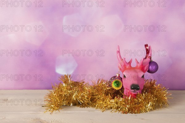 Christmas reindeer with golden ornaments
