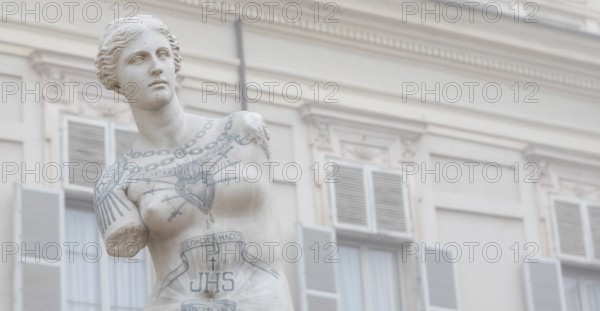 Turin, Italy, Circa January 2022: Venus de Milo with tattoos by Fabio Viale. White marble and coloured ink