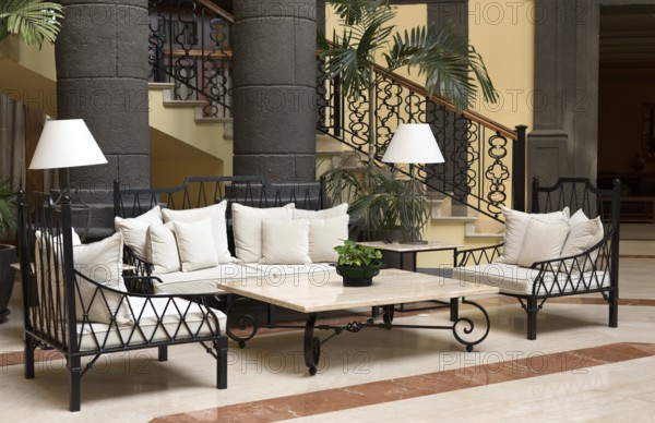 The lobby of the hotel with black columns